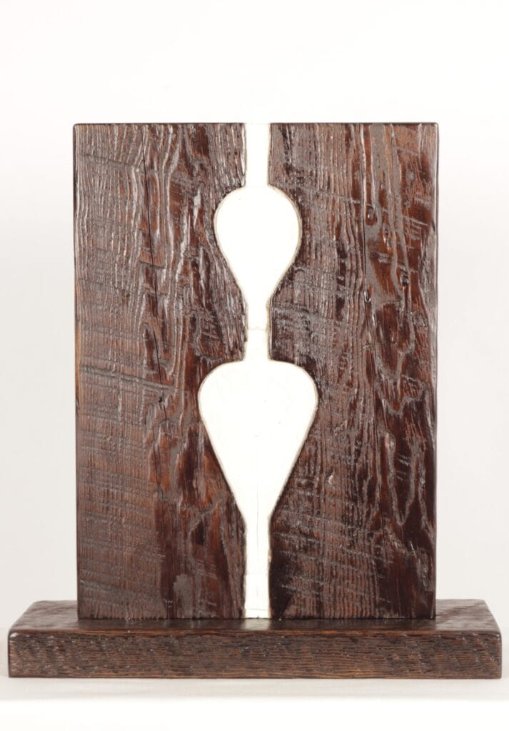 A striking abstract sculpture by Valeriu Cazacevschi, showcasing modern handcrafted contemporary art with fluid, organic shapes.