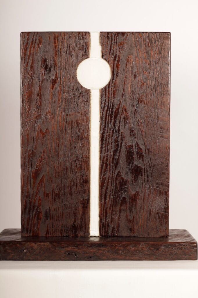 A striking abstract sculpture by Valeriu Cazacevschi, showcasing modern handcrafted contemporary art with fluid, organic shapes.