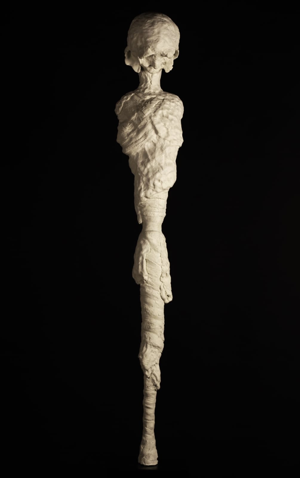 A fine art surrealist sculpture by Valeriu Cazacevschi, featuring an unusual and thought-provoking dreamscape with distorted forms and vivid colors