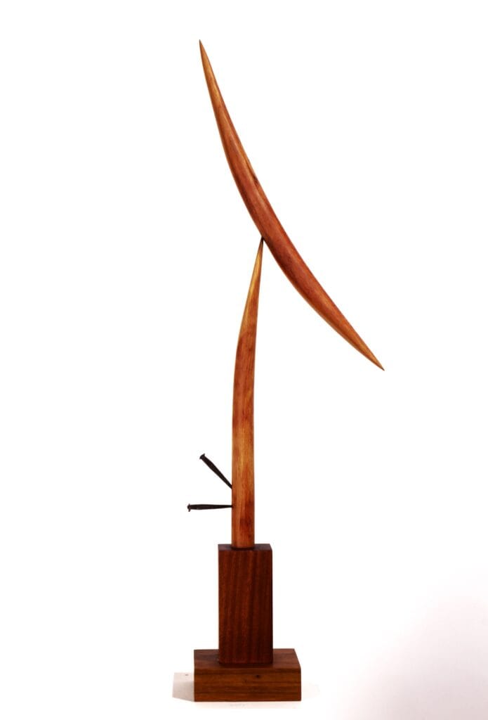 A striking abstract sculpture by Valeriu Cazacevschi, showcasing modern handcrafted contemporary art with fluid, organic shapes.