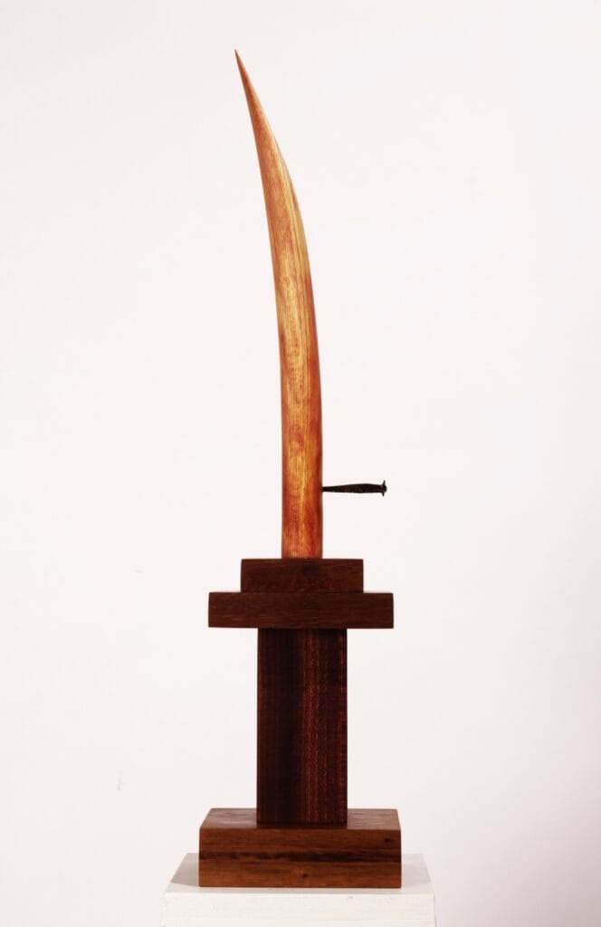 A striking abstract sculpture by Valeriu Cazacevschi, showcasing modern handcrafted contemporary art with fluid, organic shapes.