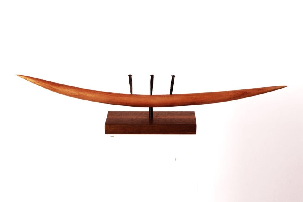 A striking abstract sculpture by Valeriu Cazacevschi, showcasing modern handcrafted contemporary art with fluid, organic shapes.